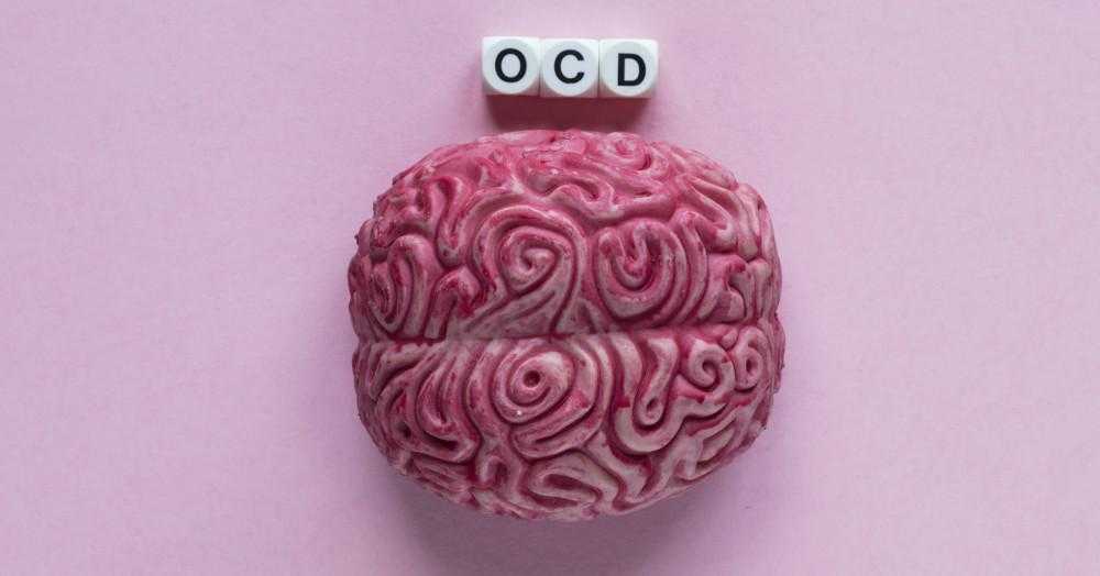 a brain and letters spelling out ocd