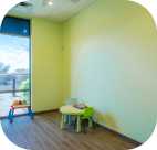 a room in the Scottsdale Children's Institute with a table in the corner